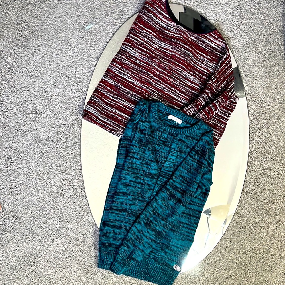 A box-cut Mango maroon sweater and a Latin Quarters teal sweater.
